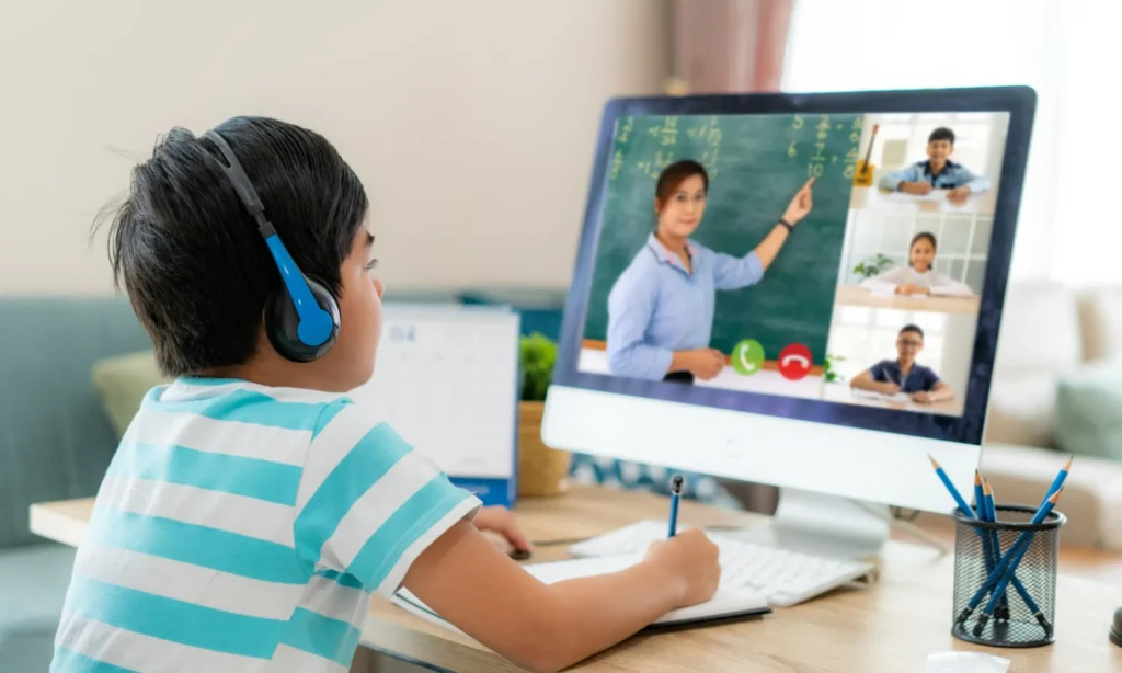 Child learning on a computer