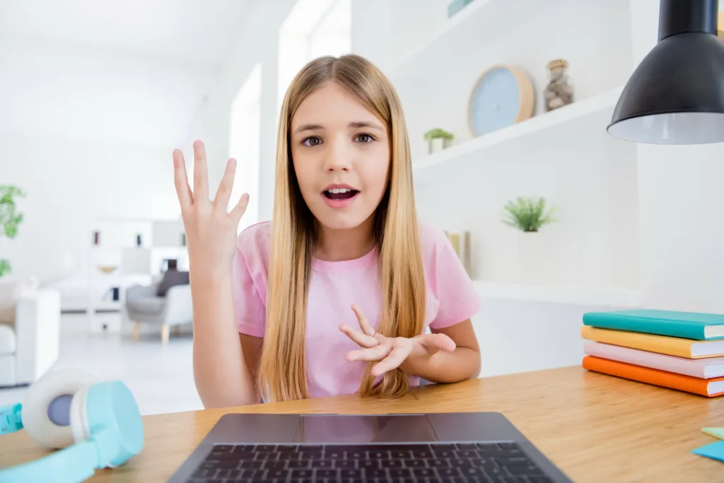 Young girl explaining somthin on video call