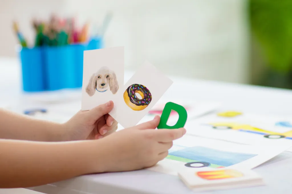 Child learning with flashcards