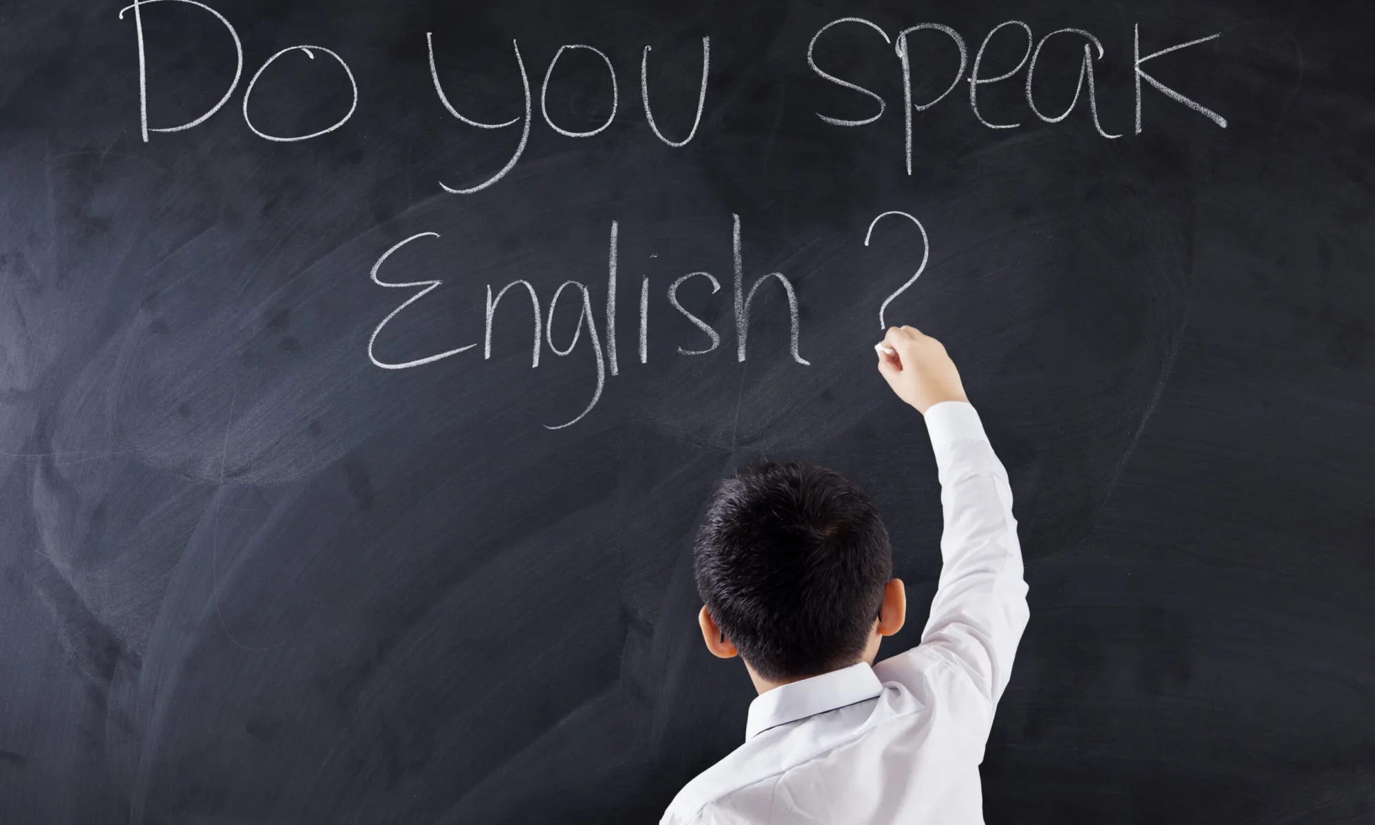 Do you speak english, boy writing on the board