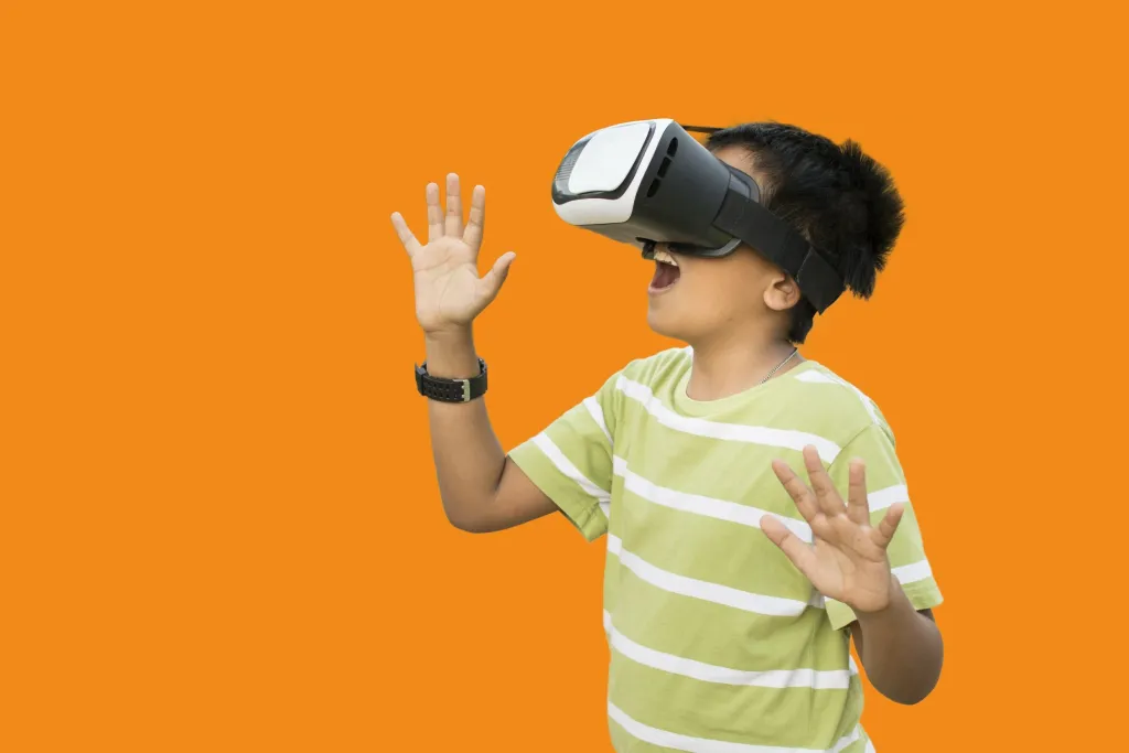 Child playing games in VR